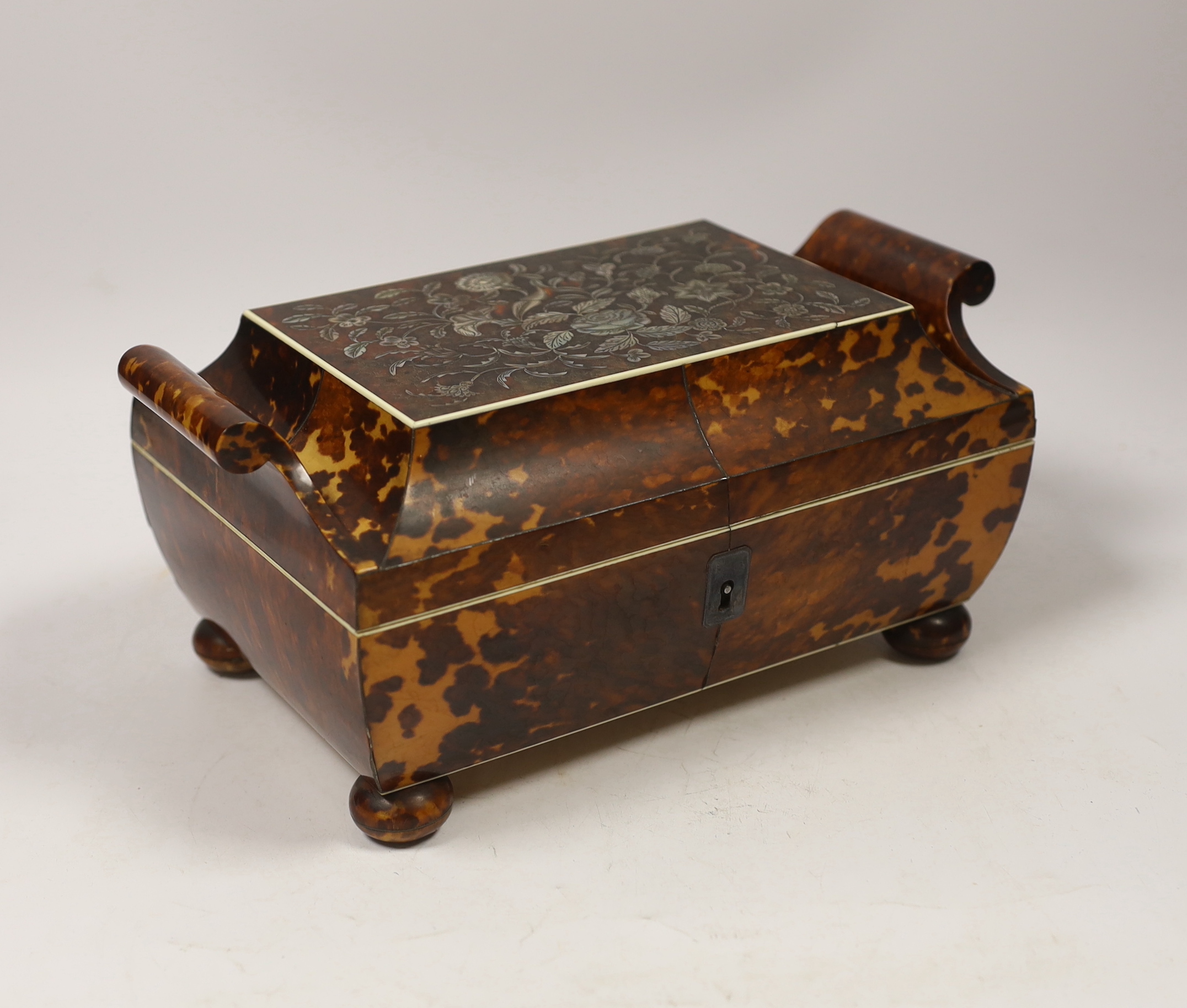 An early 19th century tortoiseshell and mother of pearl inlaid work box with ivory banding, 24cm wide, 16cm deep, 12cm high CITES Submission reference, EWCE2JLY